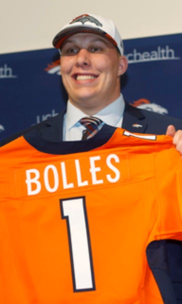 Broncos' Elway hoping to buck trend with pick of Walker
